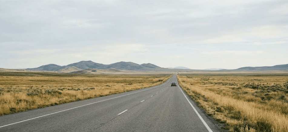 A long open road stretching toward the horizon.